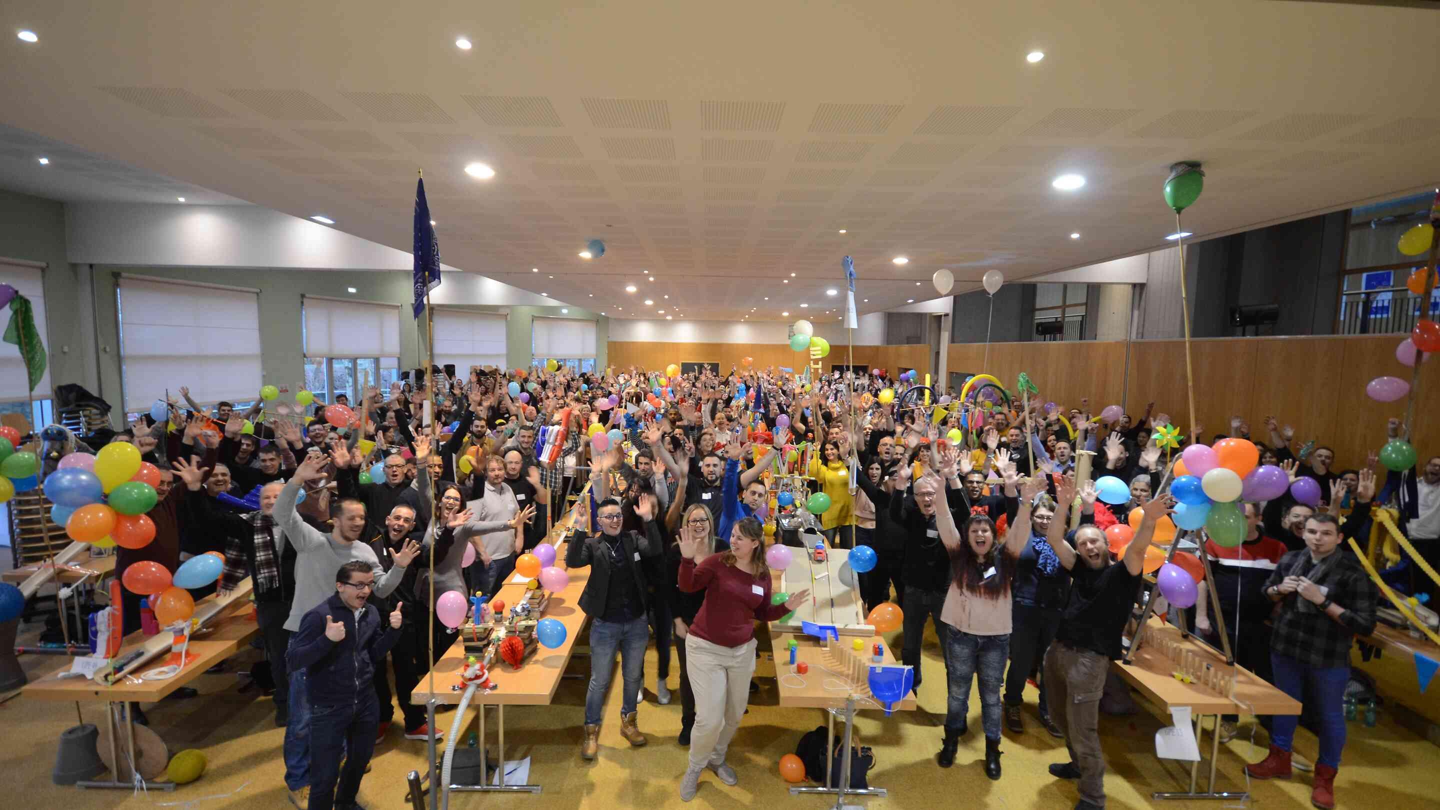 Team building for 100 people: ideas, venues, and tips!